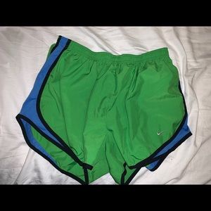 Green and blue nike shorts